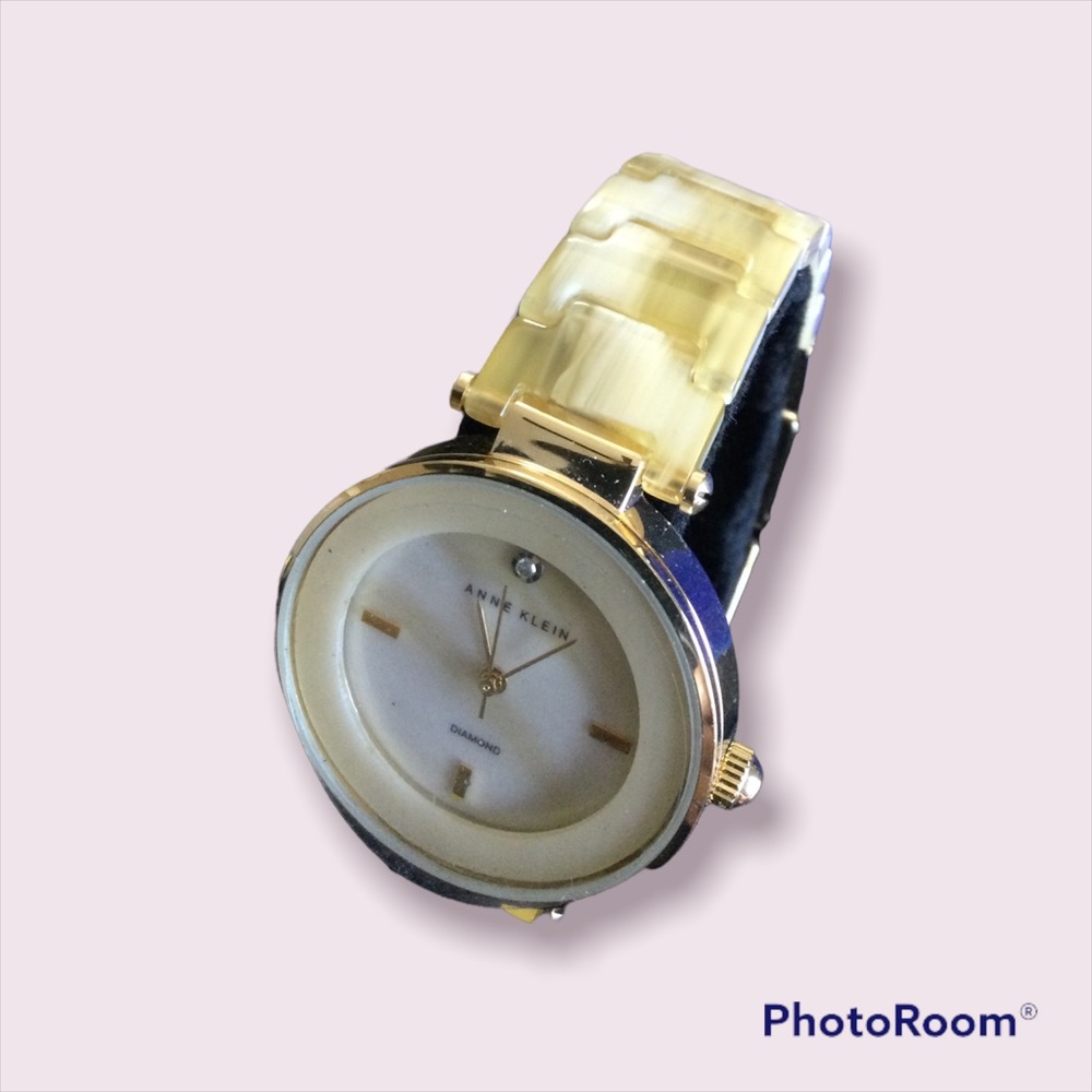 Anne Klein gold bone watch